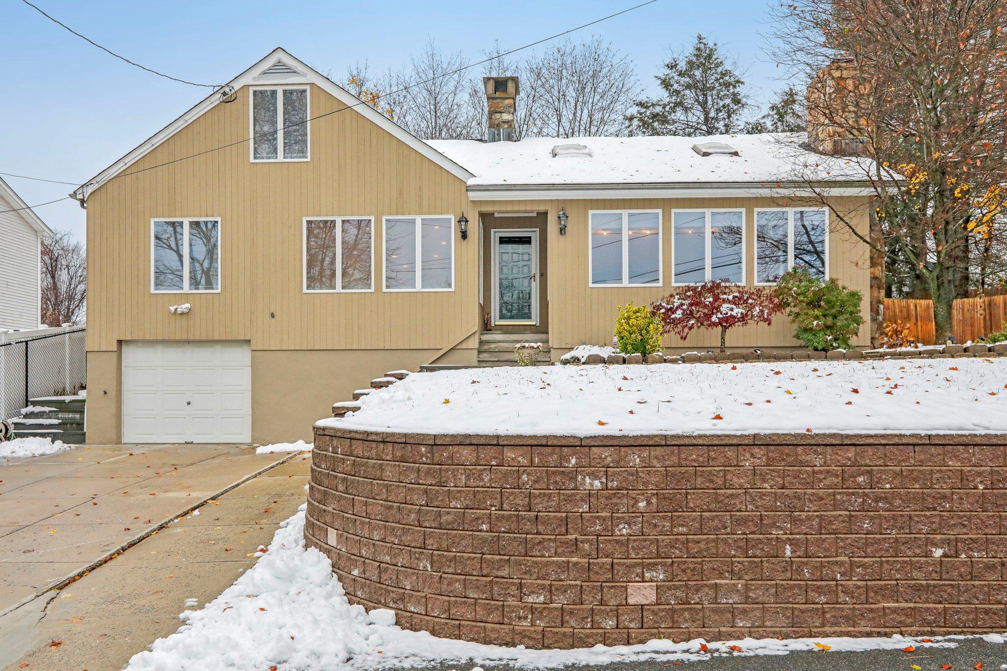 View of front of home with a garage