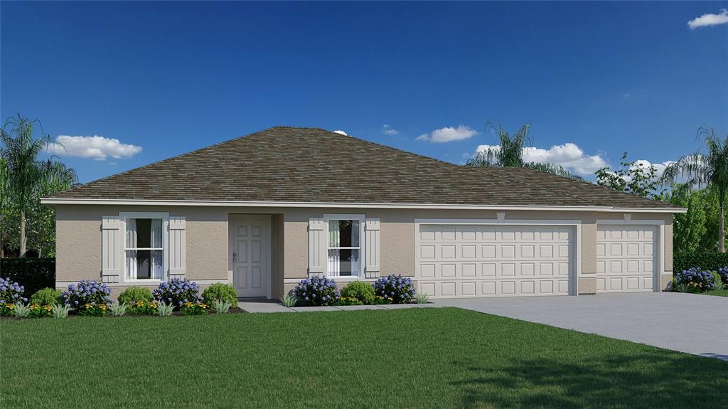 a front view of a house with a garden and yard