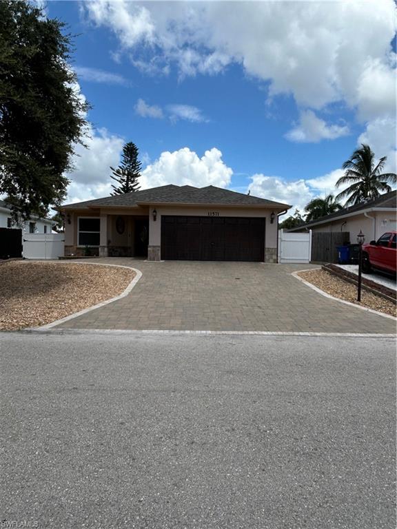 View of front of home with a garage