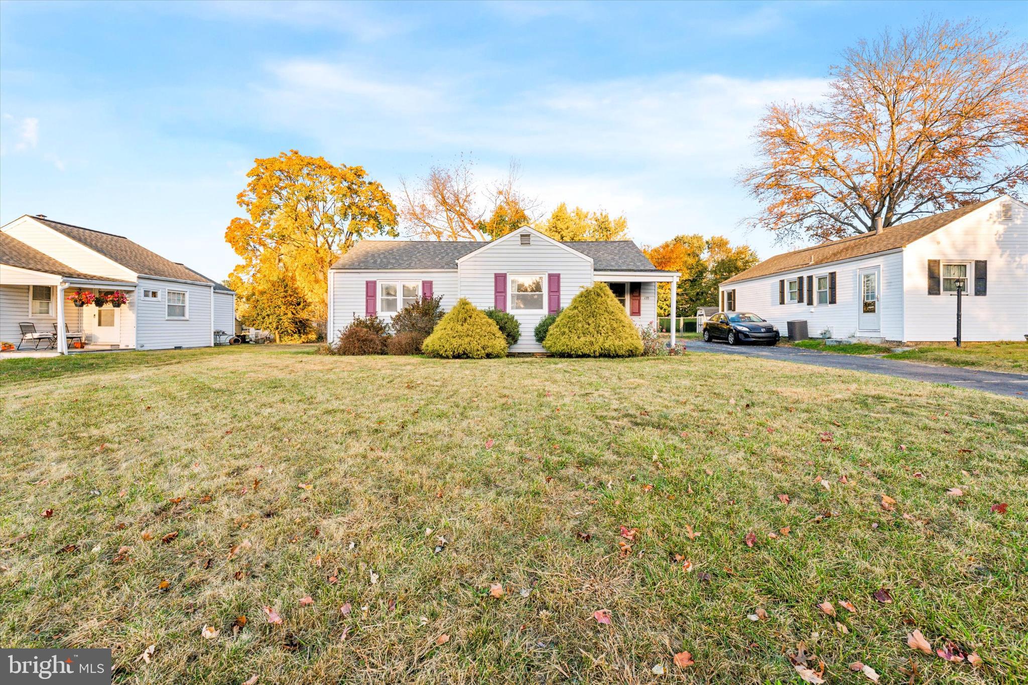 front view of a house with a big yard