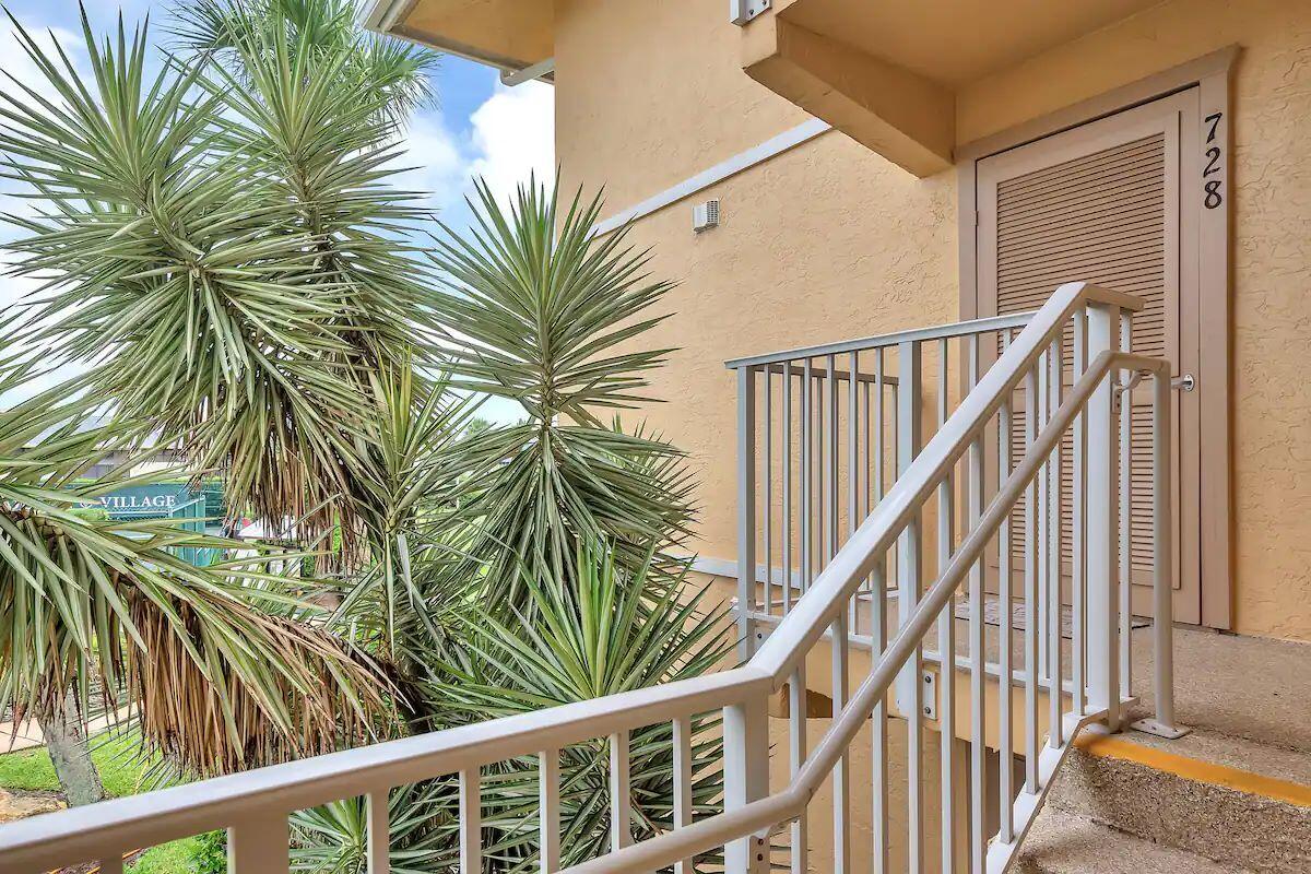 a view of balcony with small garden