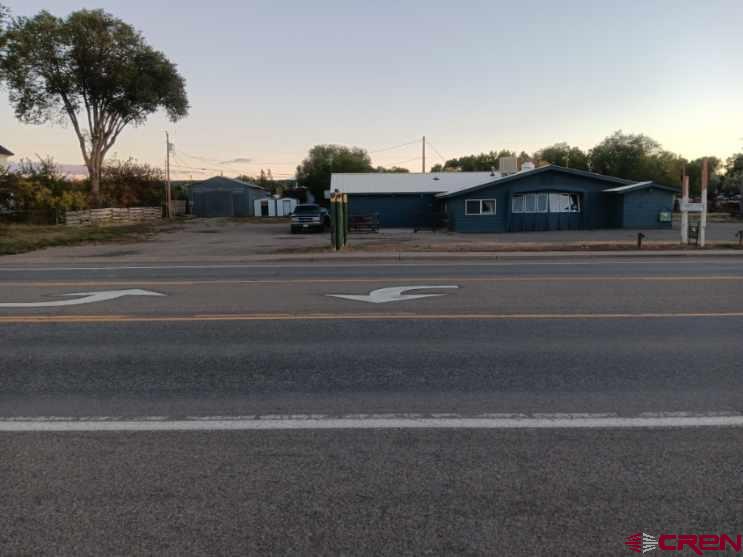 a view of a house with a street