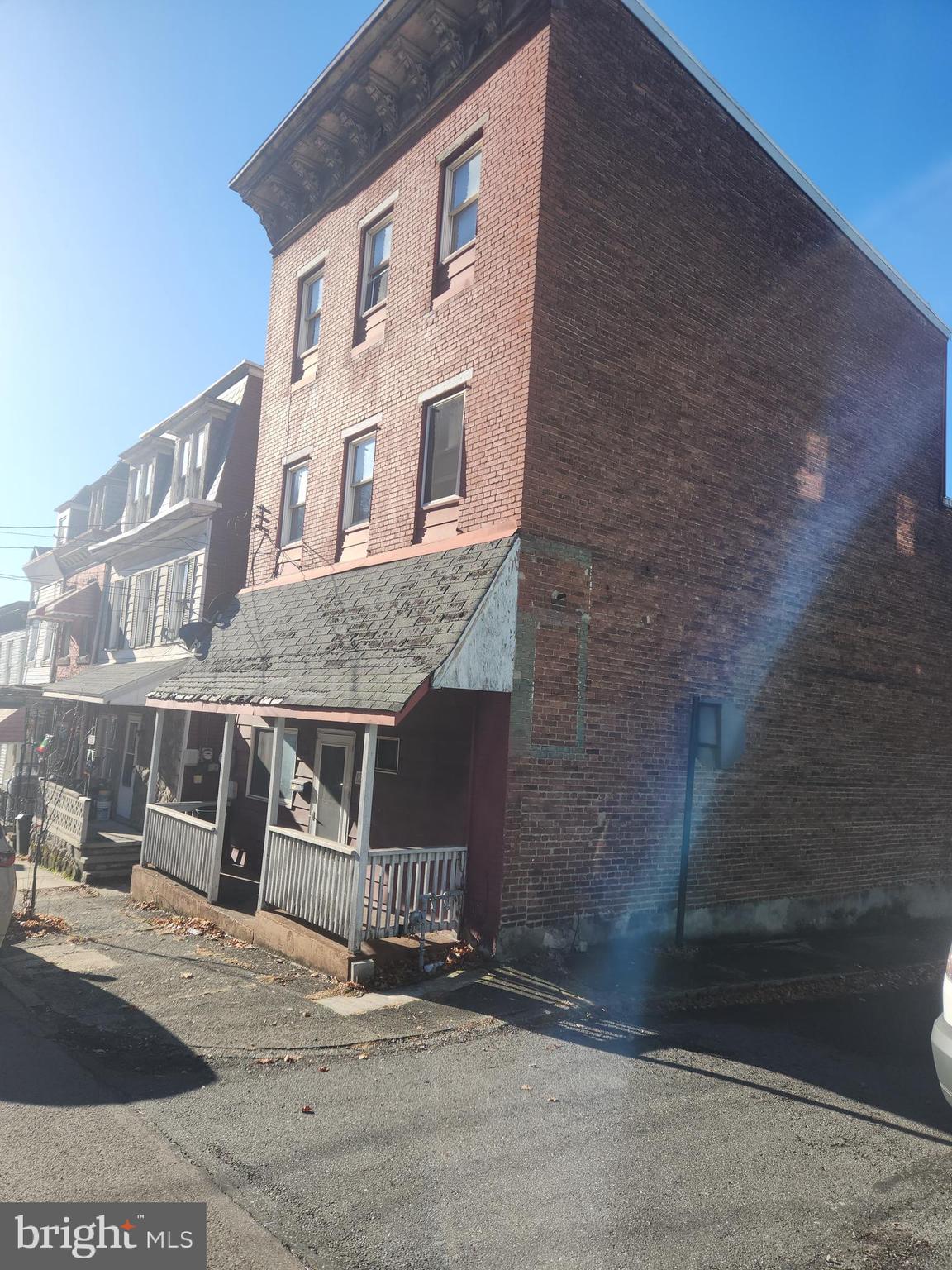 a front view of a building with pathway