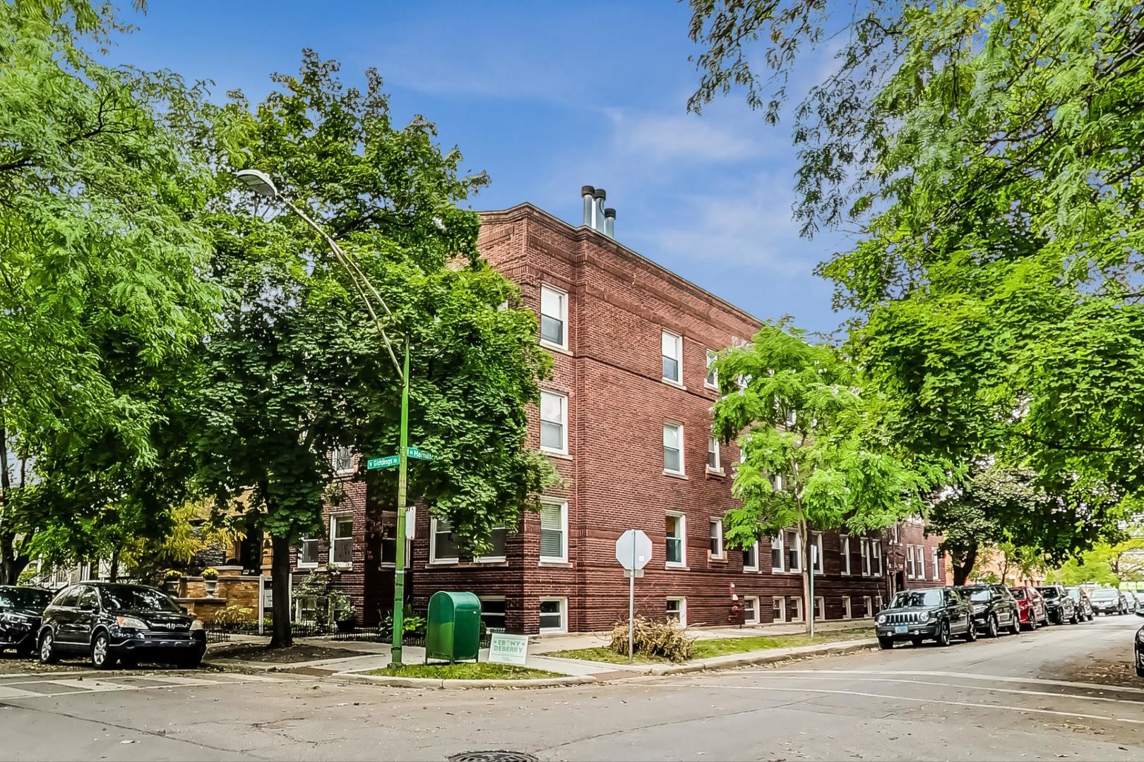 front view of a building with a street