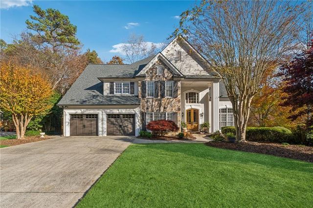 $950,000 | 3015 Oaktree Court Northeast | Windsor Oaks