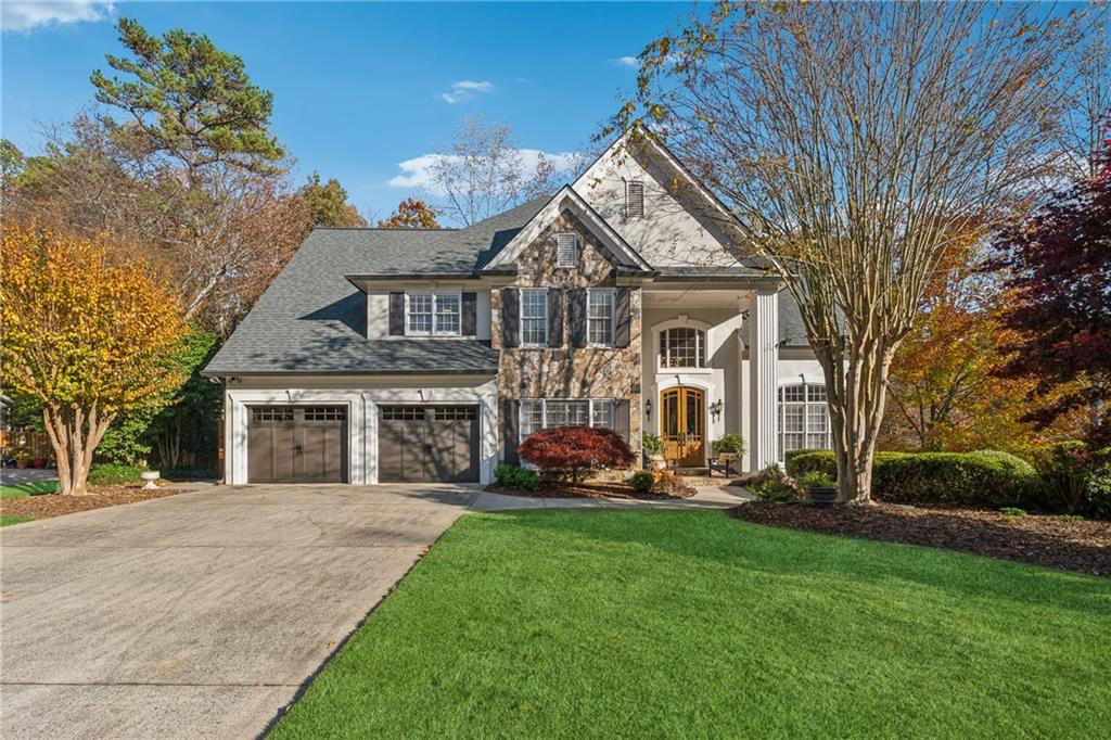 front view of a house with a yard