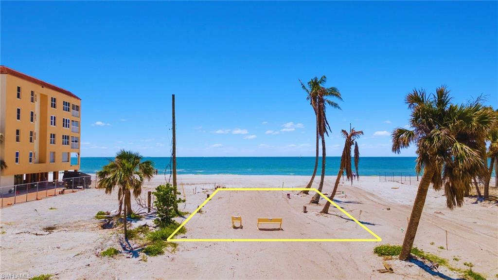 View of water feature featuring a beach view