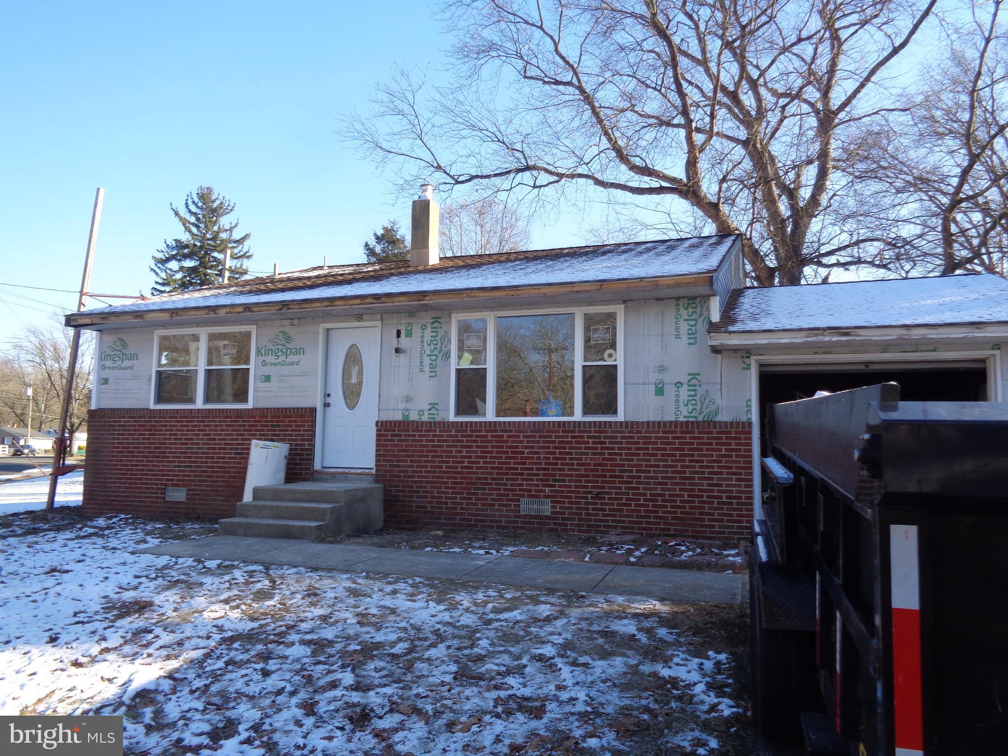 front view of house with a yard