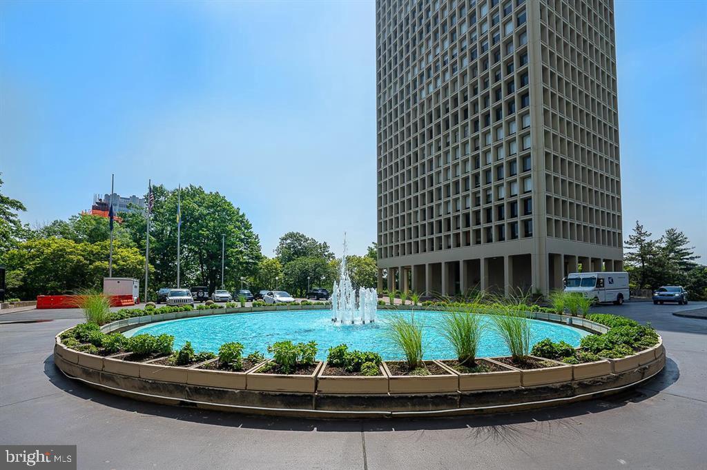 a building view with a garden space