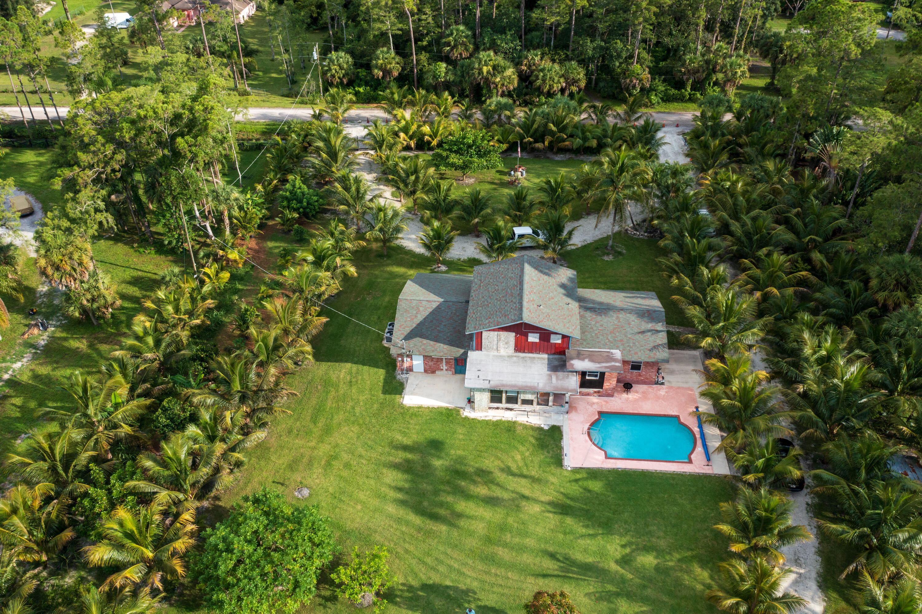 a house view with a sitting space and garden