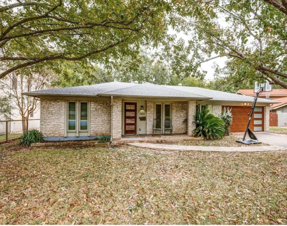 a front view of a house with a porch