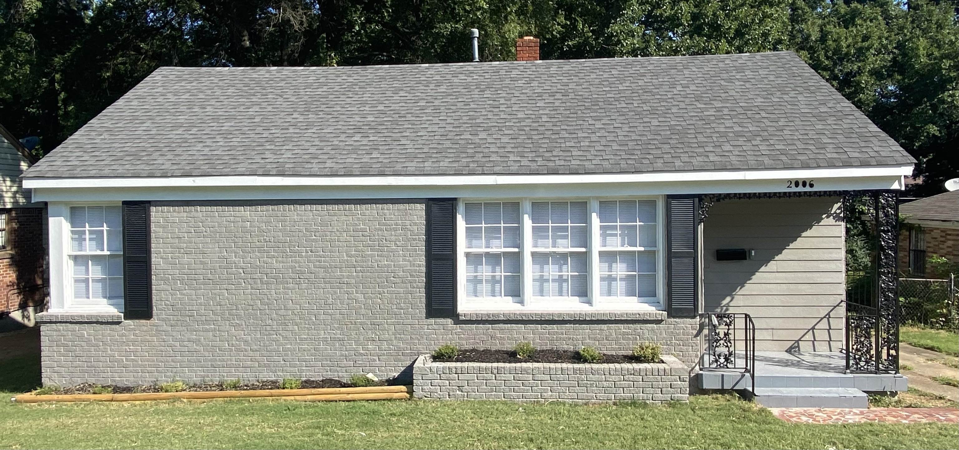 a view of house with front door