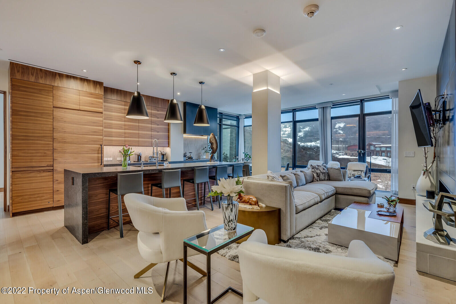 a living room with fireplace furniture and a flat screen tv