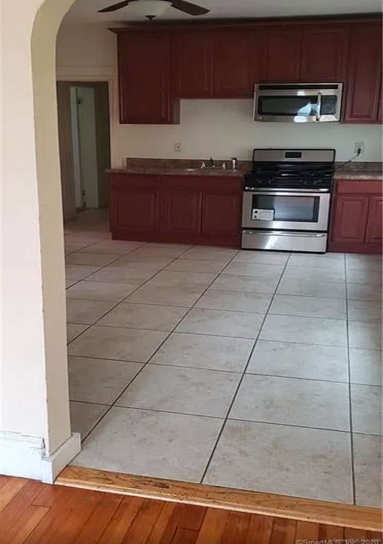 a kitchen with a sink and a stove