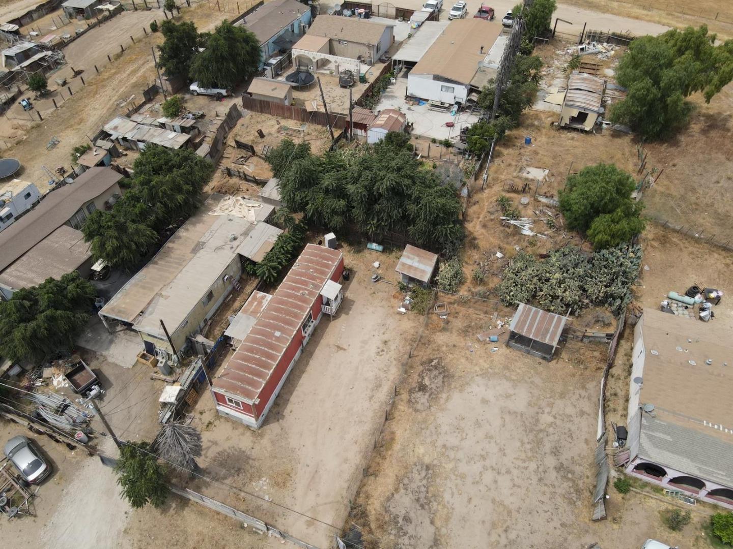 an aerial view of residential house with outdoor space