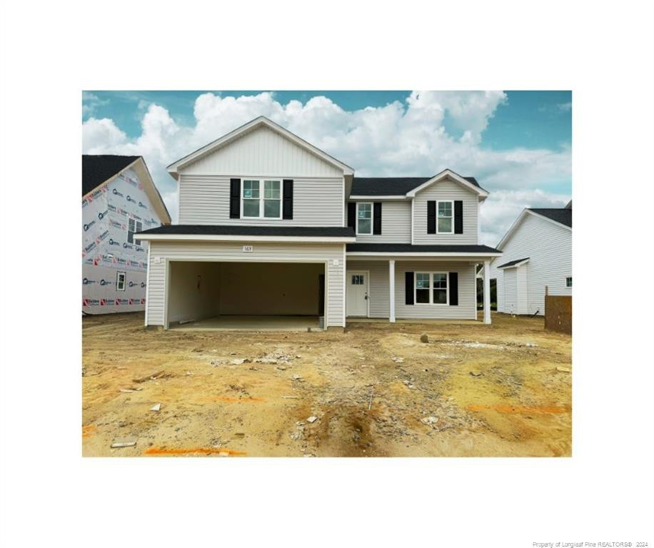 a view of an house with backyard space