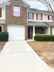 a front view of a house with yard