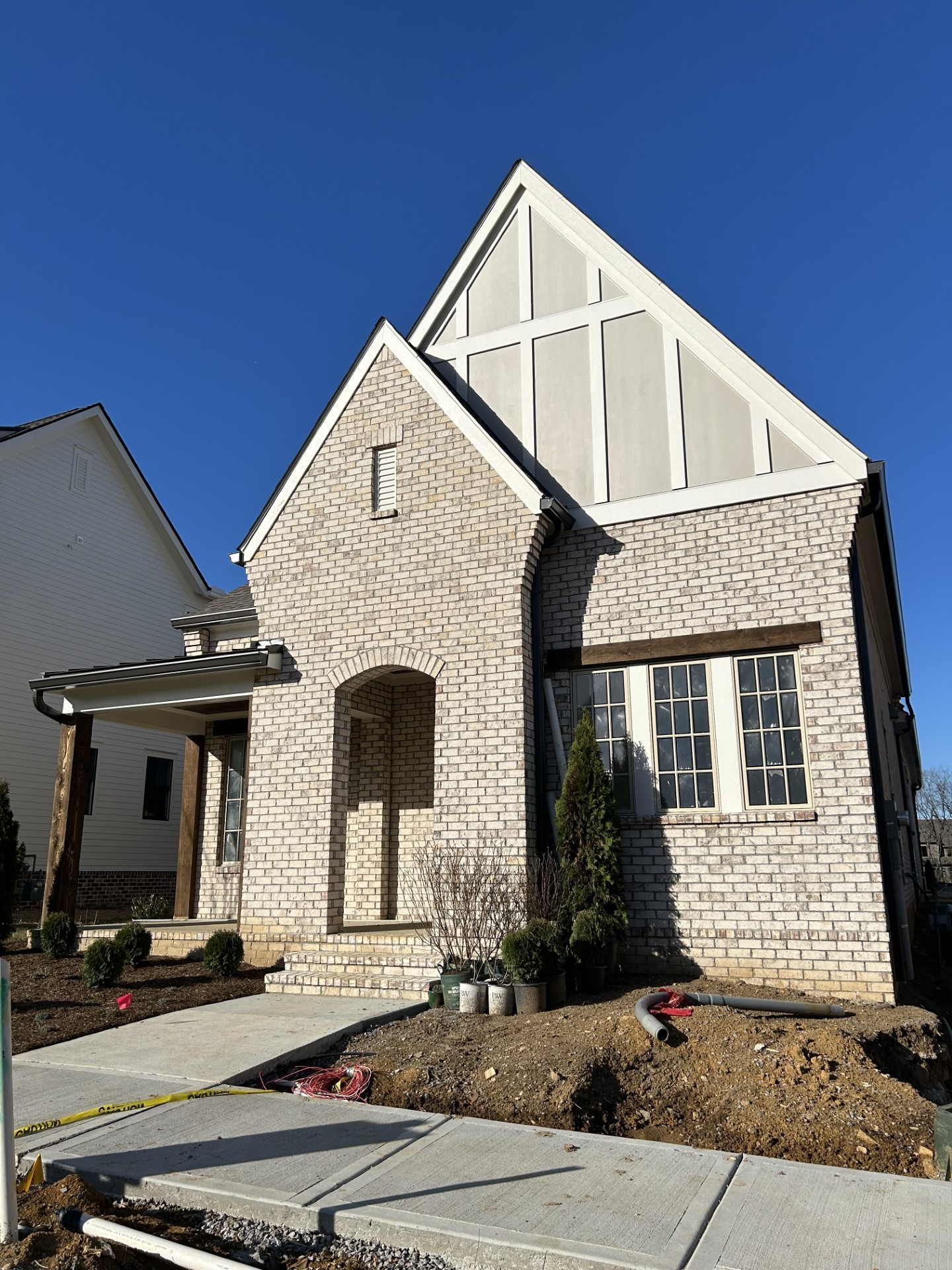 a front view of a house with garage