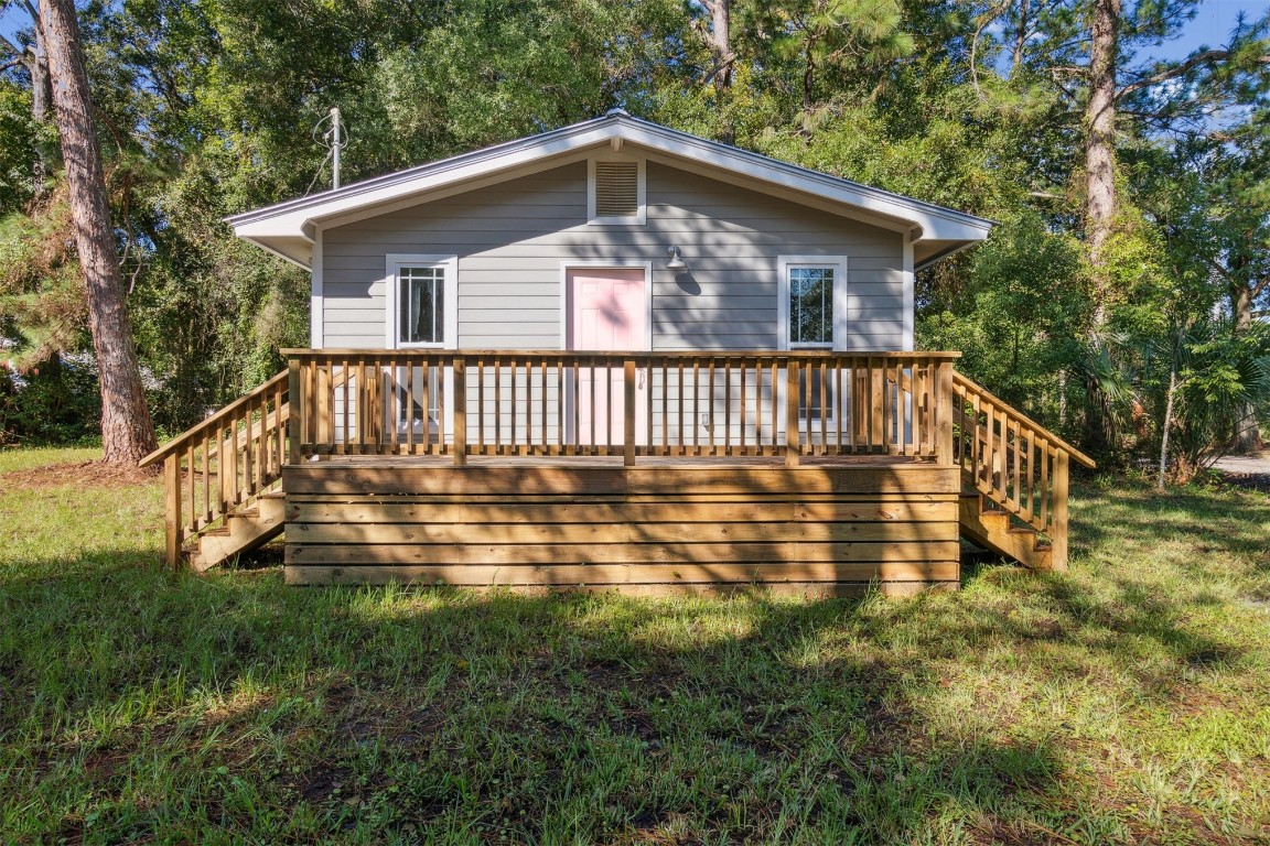 a view of a house with a small yard