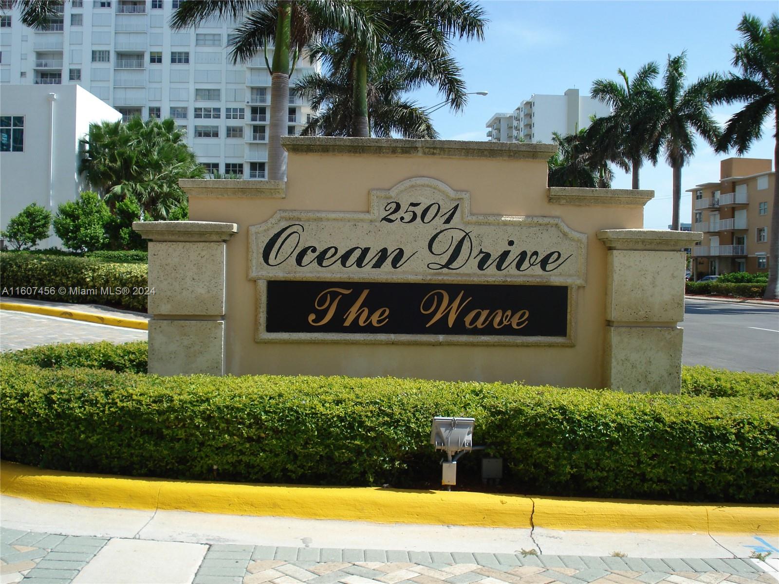 a view of front door and sign board