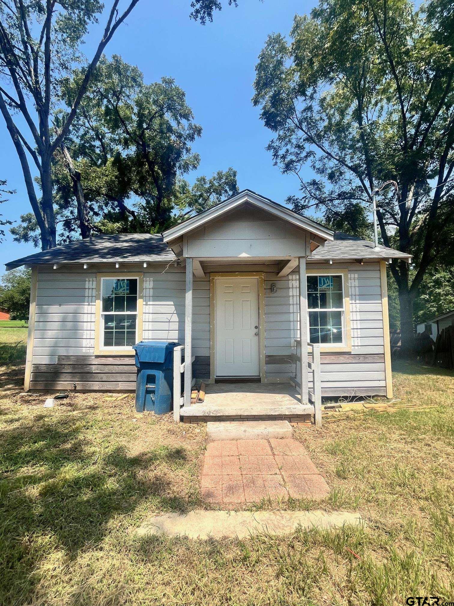 front view of house with a yard