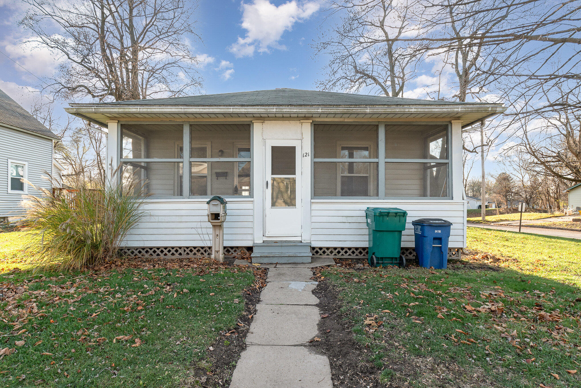 front view of a house with a yard