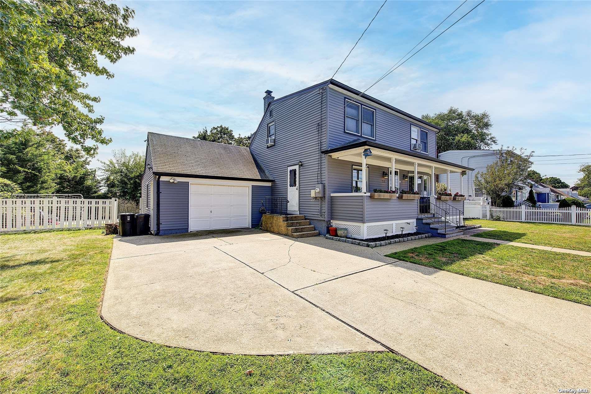 front view of house with a yard