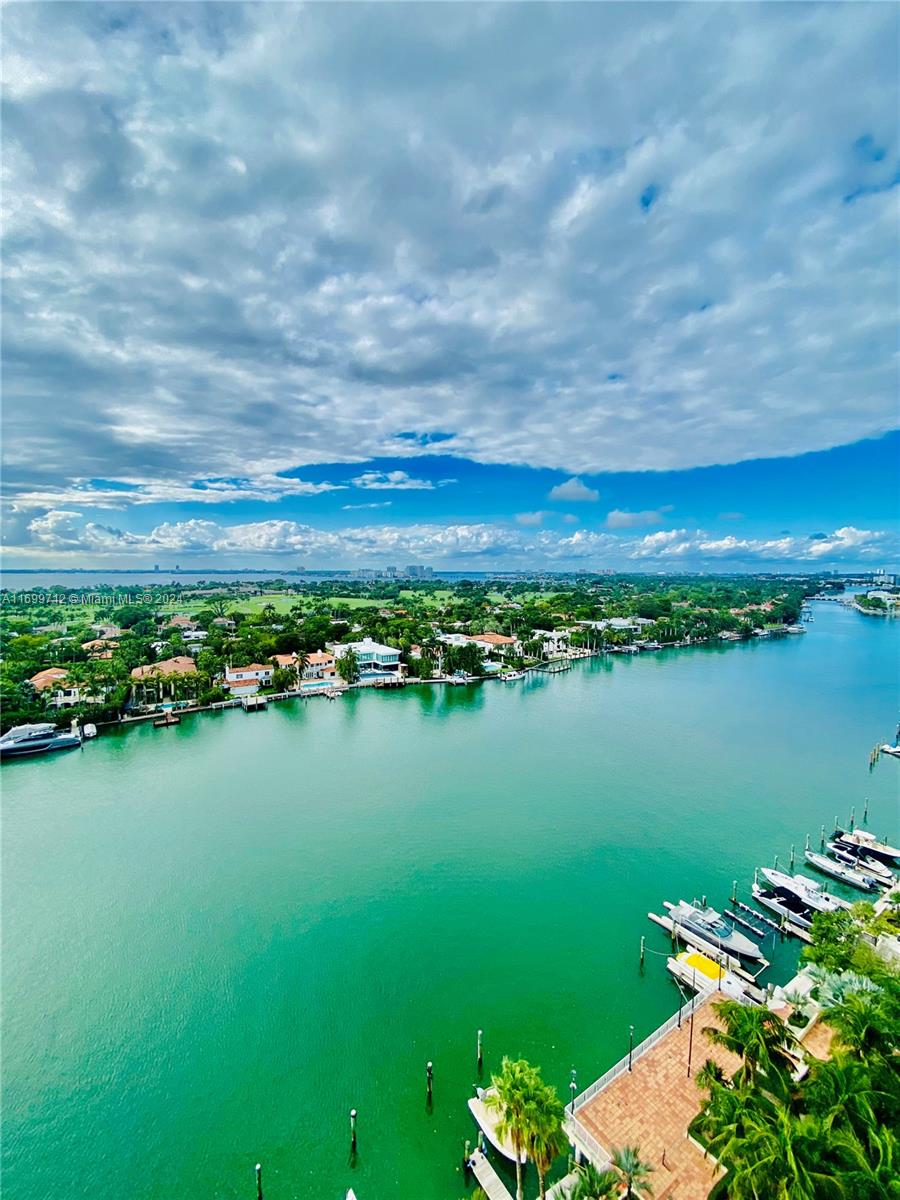 a view of a lake with a city