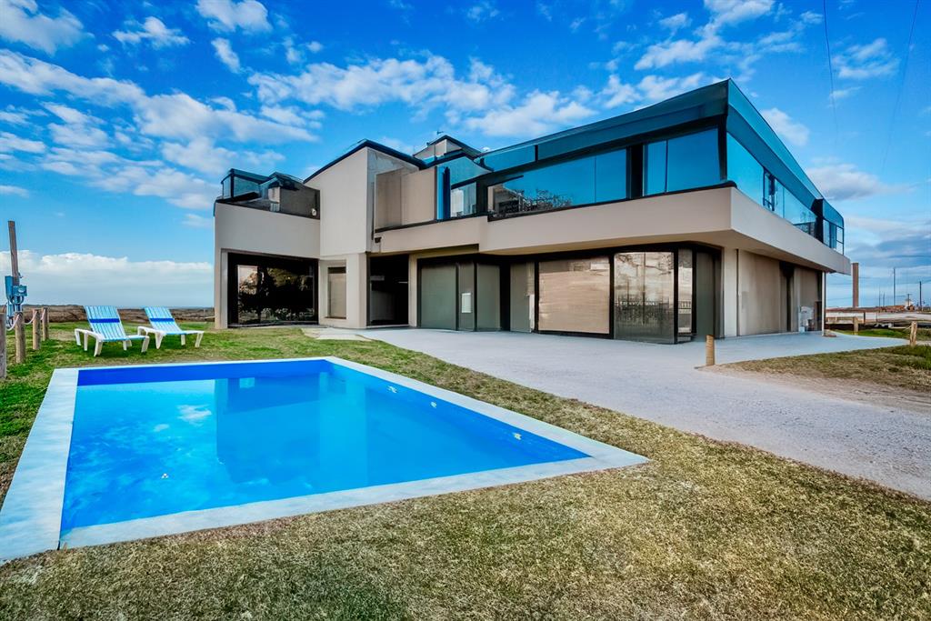 a view of pool with outdoor seating