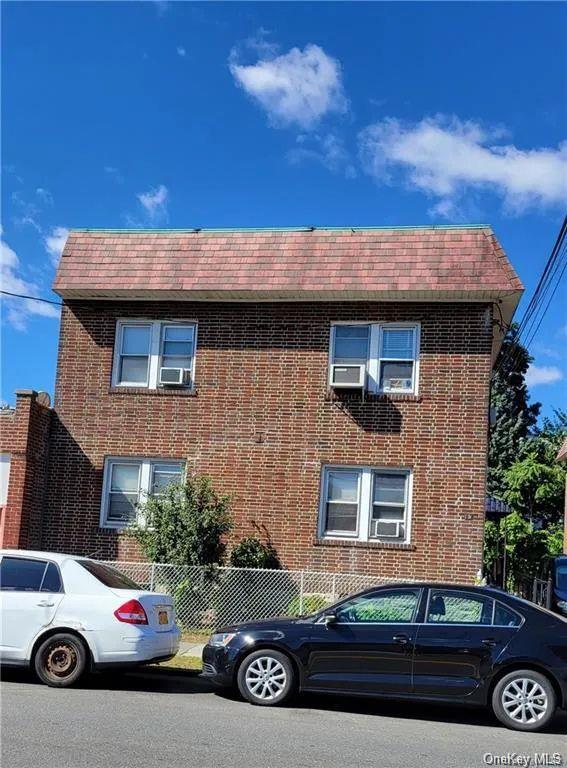 a car parked in front of a house