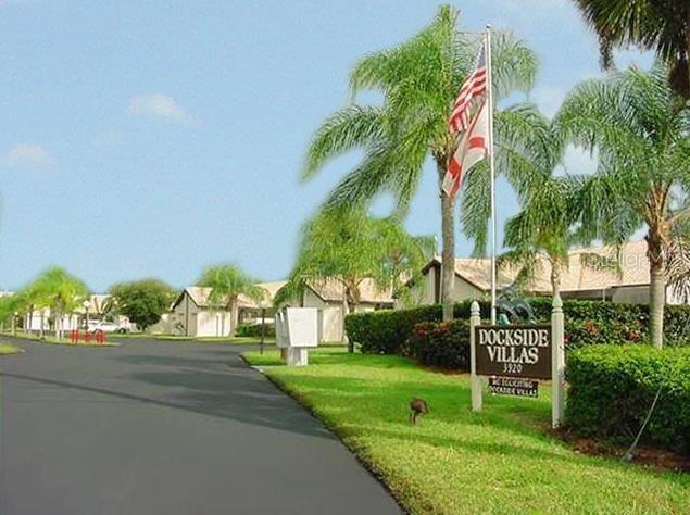 a view of a park that has a sign on it