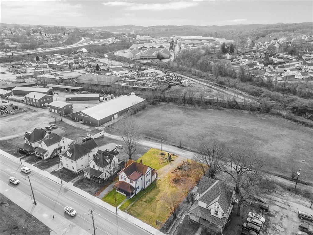 an aerial view of residential house with outdoor space