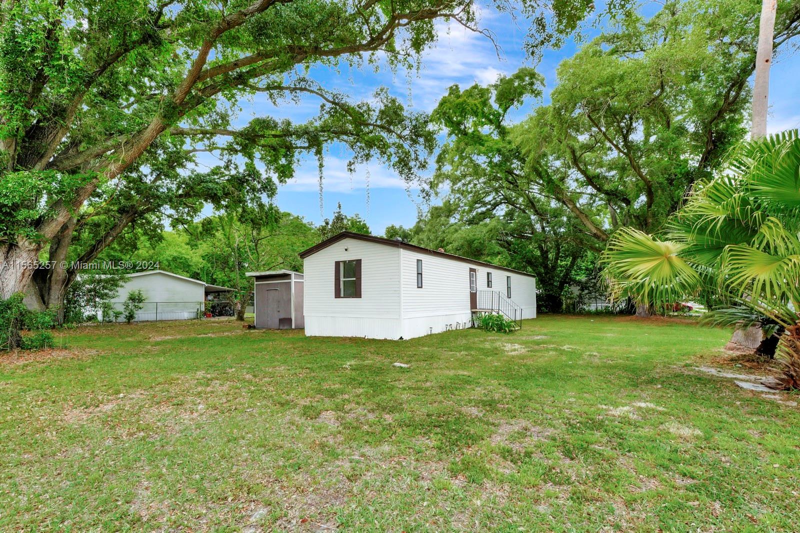 a house with a tree in front of it