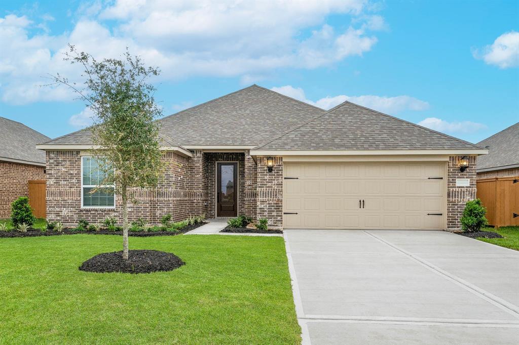 The Houghton Plan by LGI Homes features 4 bedrooms, 2 bathrooms, and a 2 car garage . Completed example being built at 3113 Banyan Drive. Actual completed home details may vary.