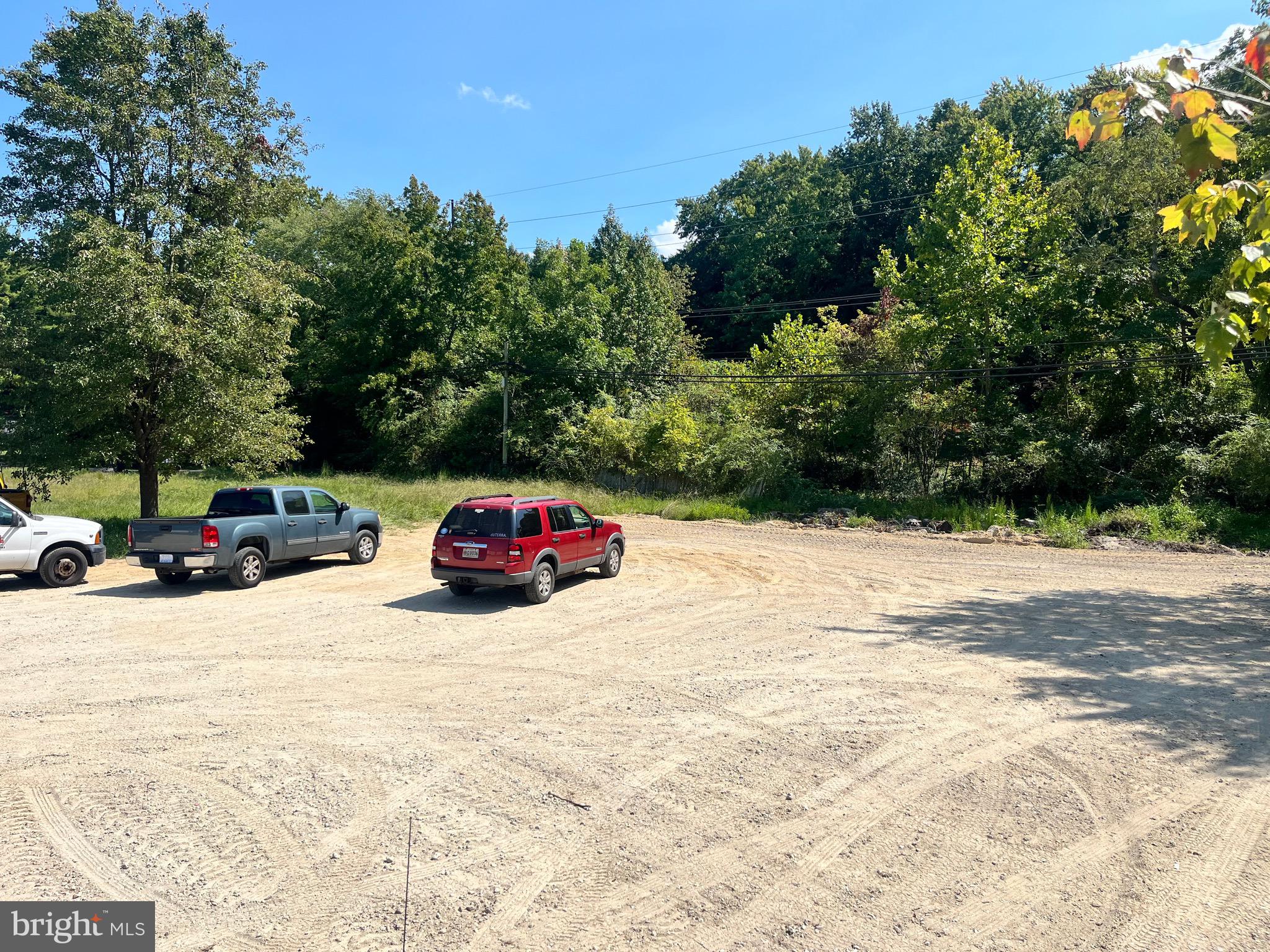 a view of a car parked on the side of the road