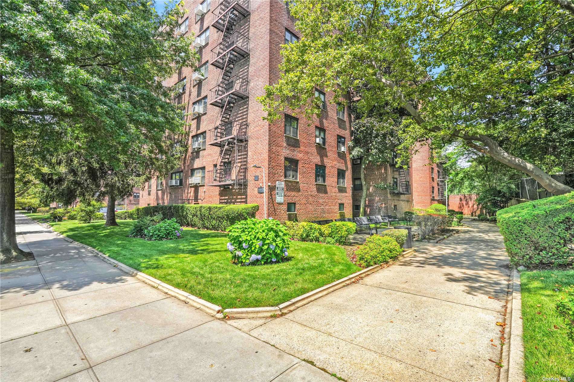 a view of a building with a garden