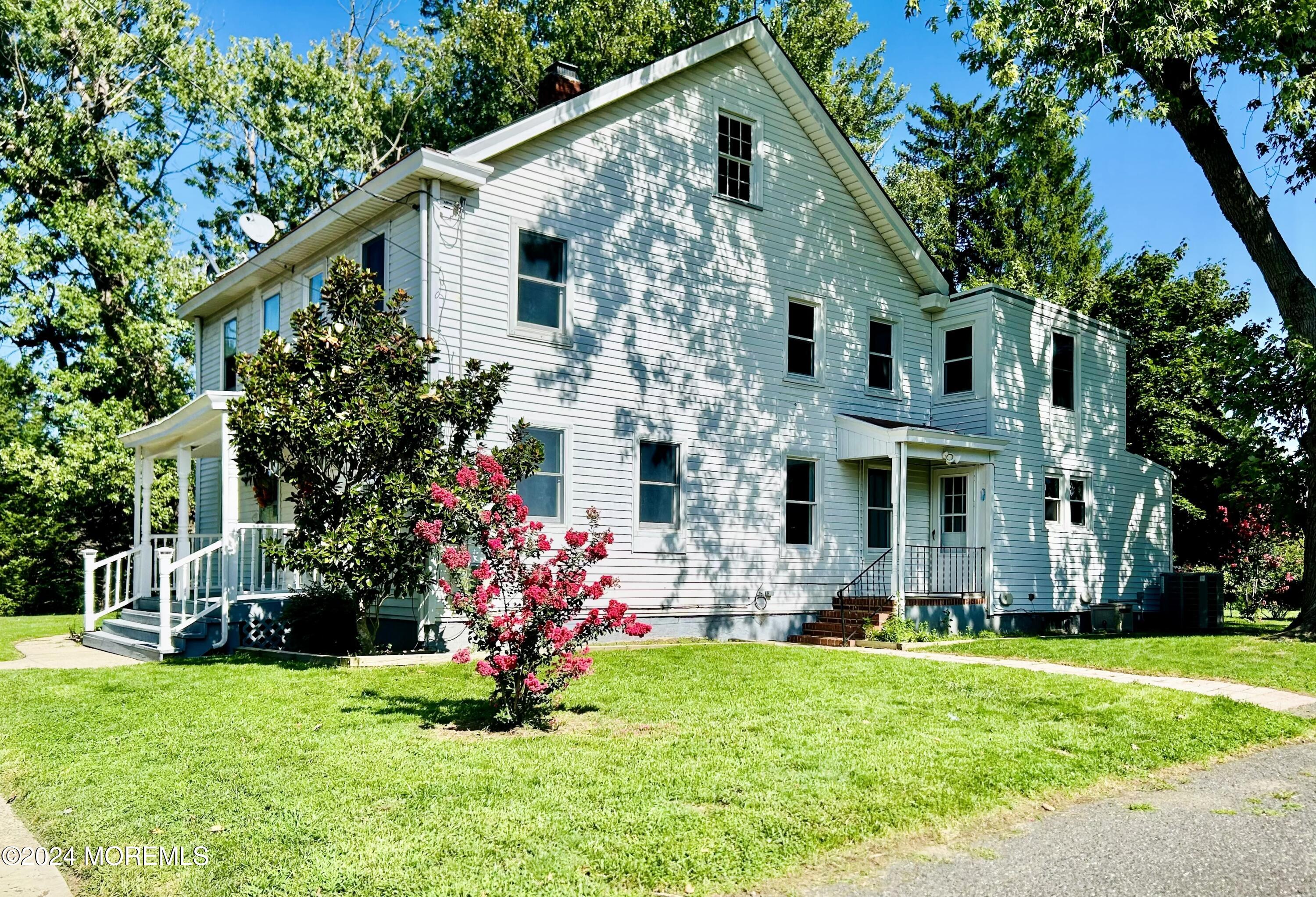 a front view of house with yard