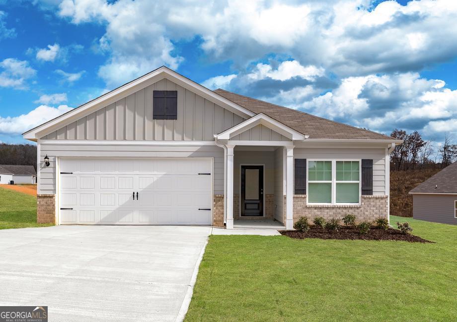 a view of a house with backyard