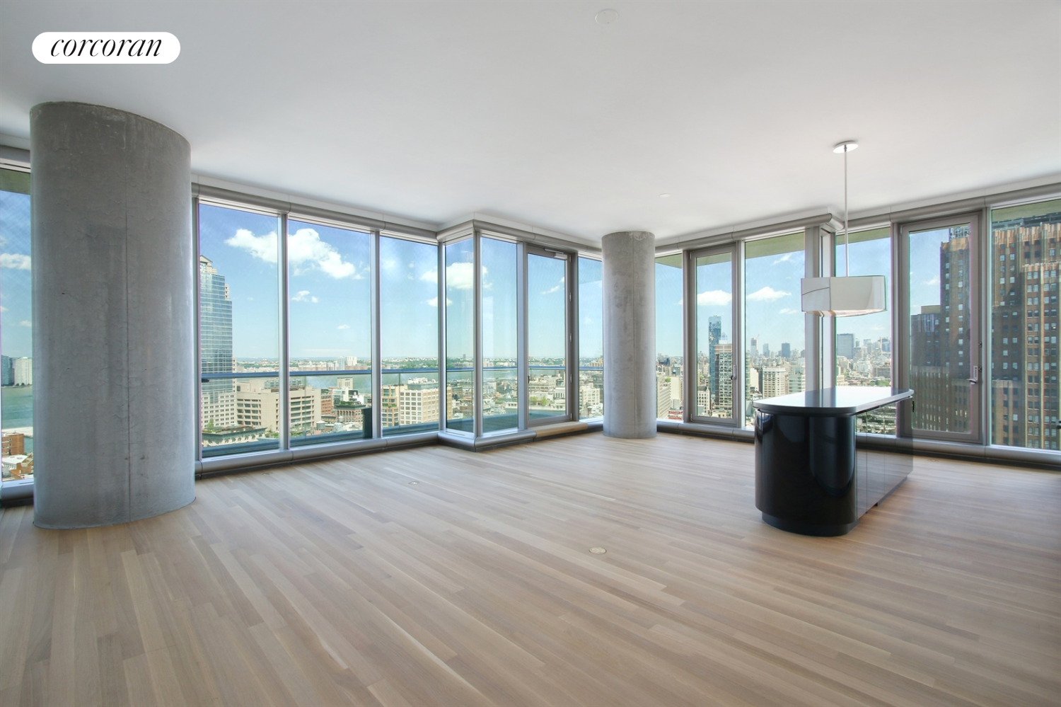 a view of workspace with furniture and wooden floor