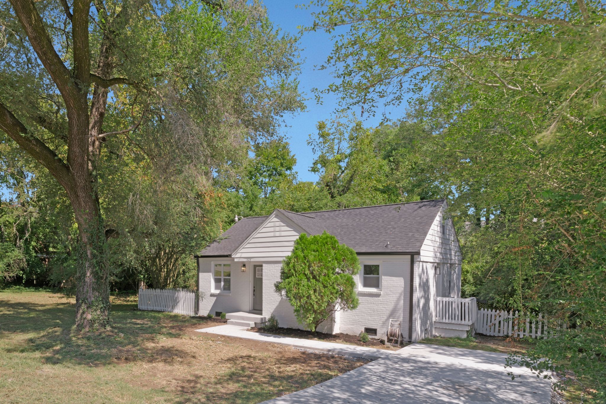 front view of a house with a small yard