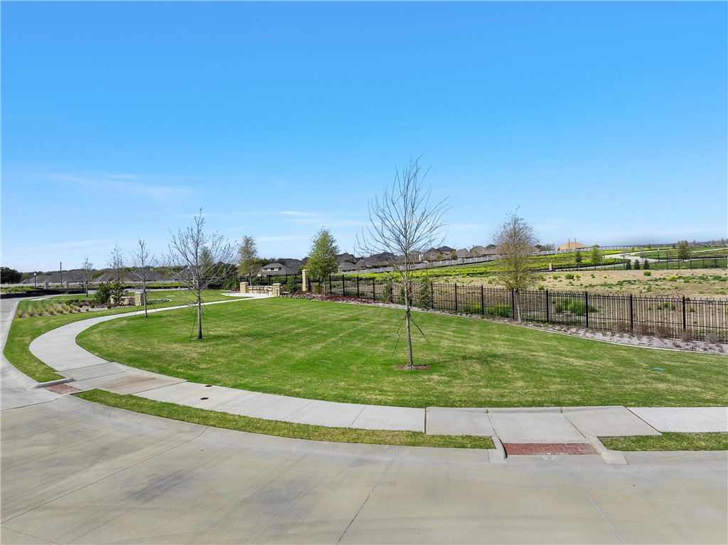 a view of a golf course with a park