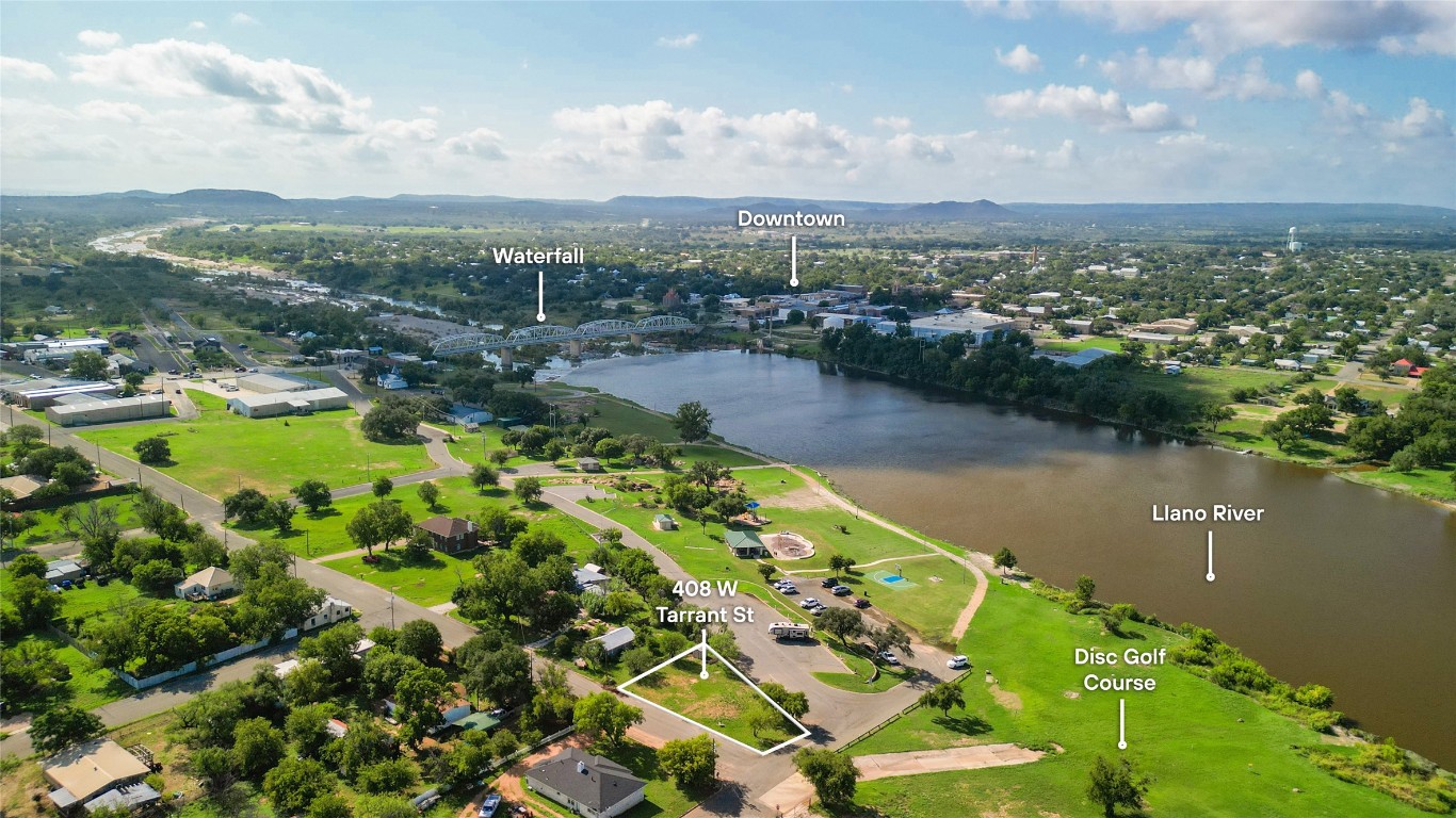 a view of a lake with a city