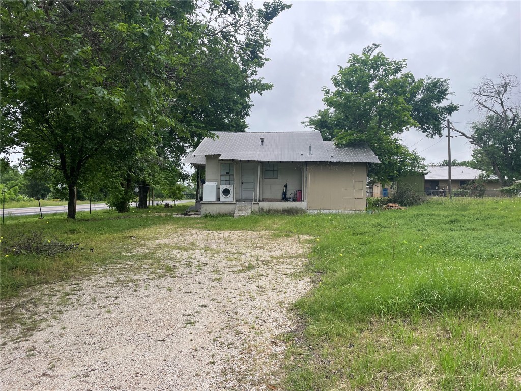 a house view with a garden space