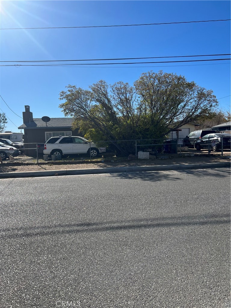 a view of a house with a street