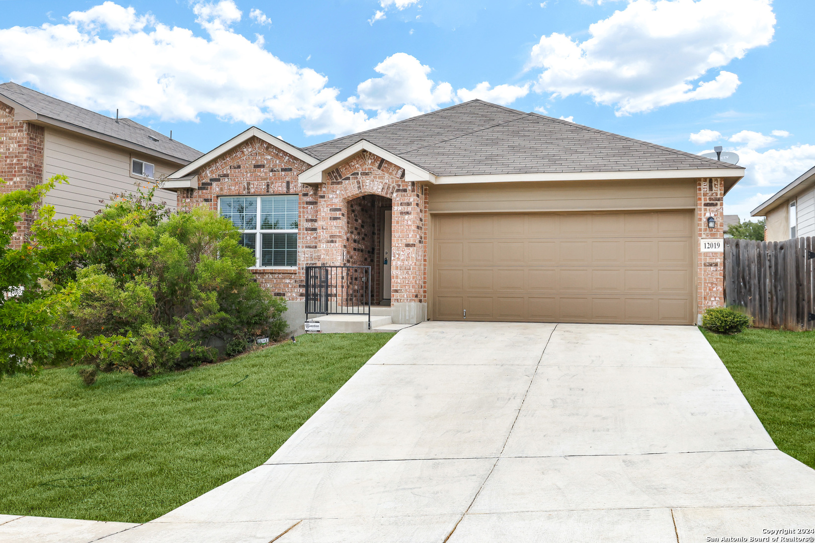 a front view of house with yard