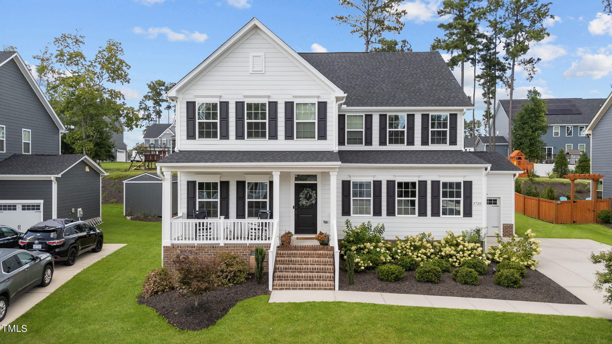 front view of a house with a yard