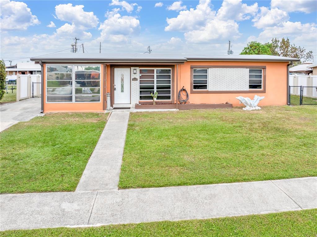 a front view of a house with yard