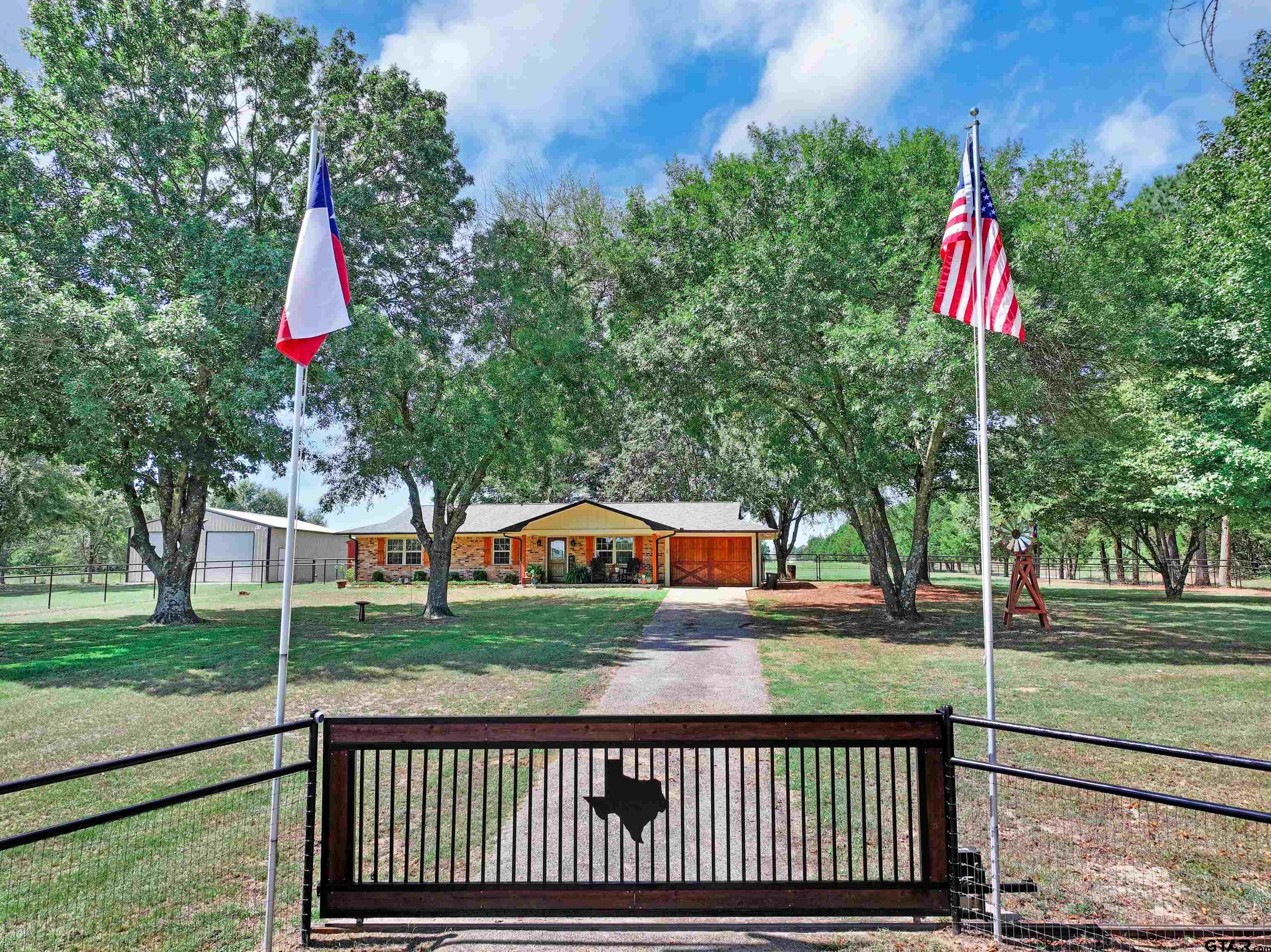 a flag is sitting in the middle of a park