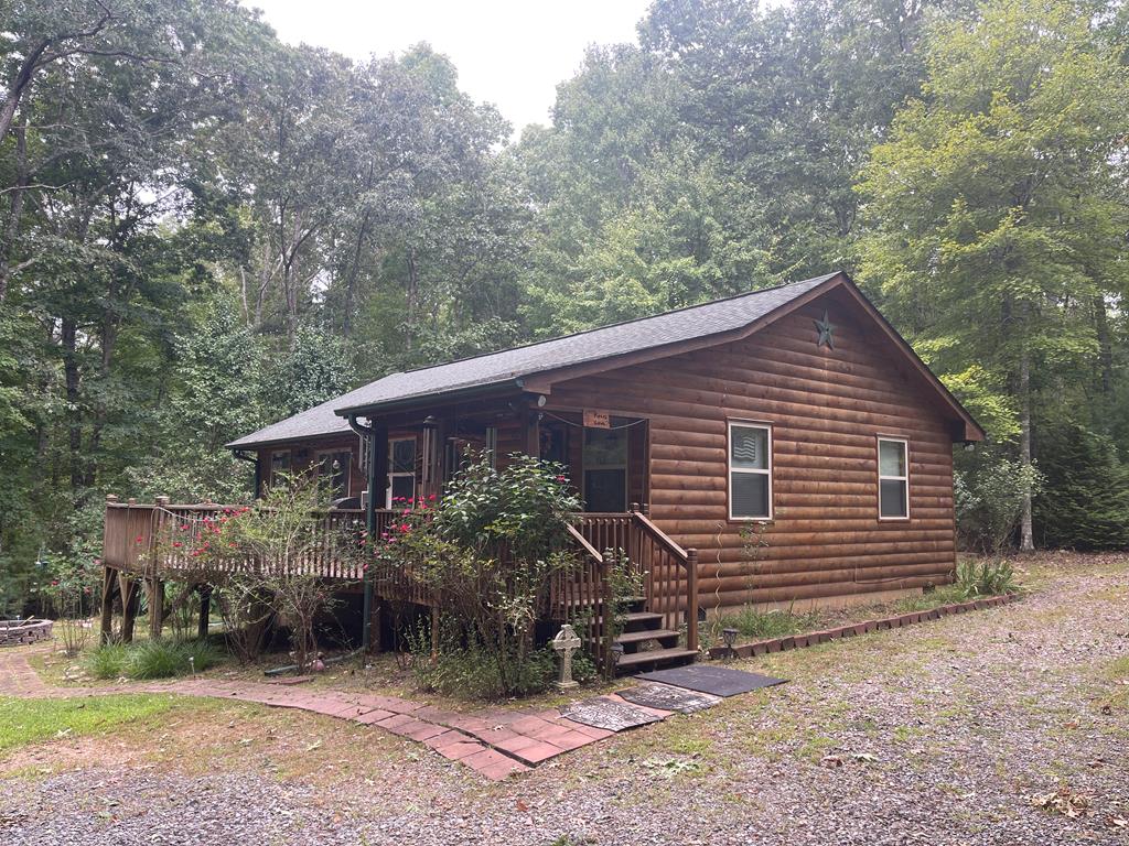 a view of a house and a yard