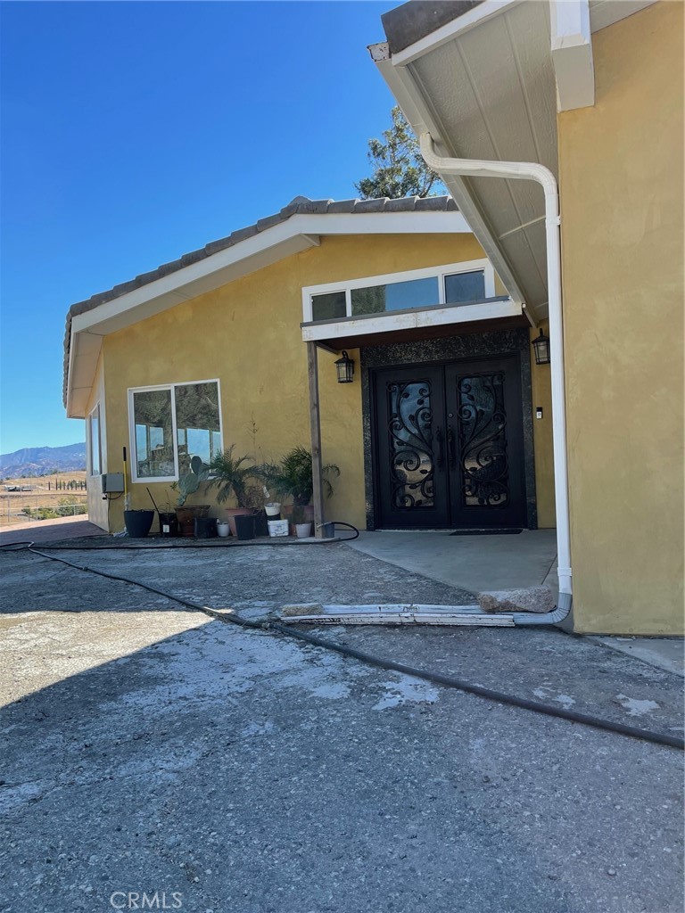 a view of a house with a porch